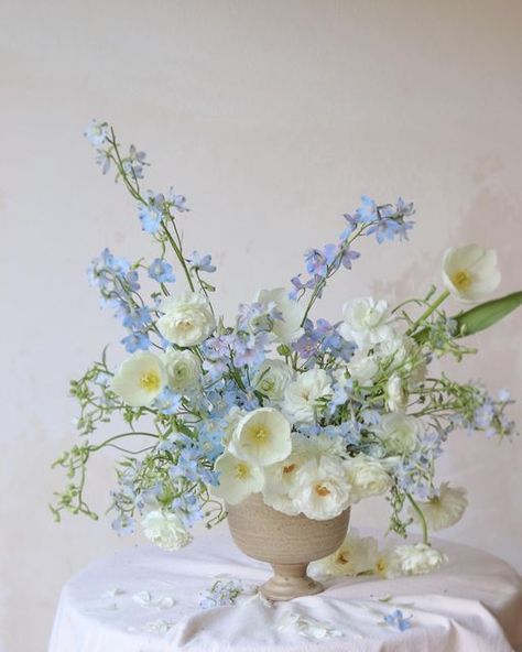 SWEET KVITKA on Instagram: "Something new, something blue, something old... My favourite is blue... #floralarrangement #floristry #simplystyledflowers #flowerstalking" White And Blue Wedding Flowers Centerpieces, Blue Wedding Centerpieces Diy, Blue And White Wedding Florals, White And Blue Floral Arrangements, Blue Wedding Flower Arrangements, Josie Wedding, Blue Flower Bouquet, Blue Flower Arrangements, Blue Spring Flowers