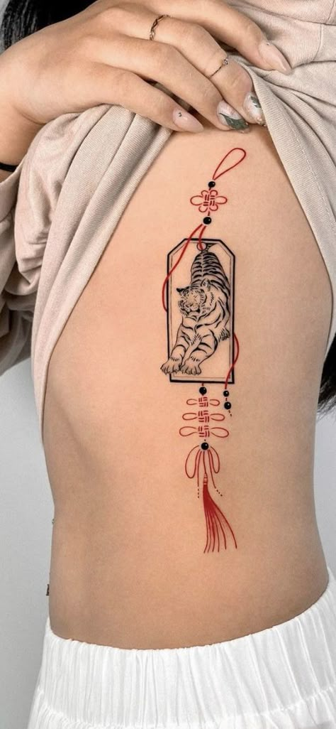 Asian Tassel Tattoo, Unique Asian Tattoo, Astrological Back Tattoo, Korean Back Tattoo Women, Traditional Chinese Tattoo Art, Small Asian Tattoo Ideas, Asian Tattoos For Women Japanese Style, Traditional Asian Tattoo Art, Japanese Patch Work Tattoo