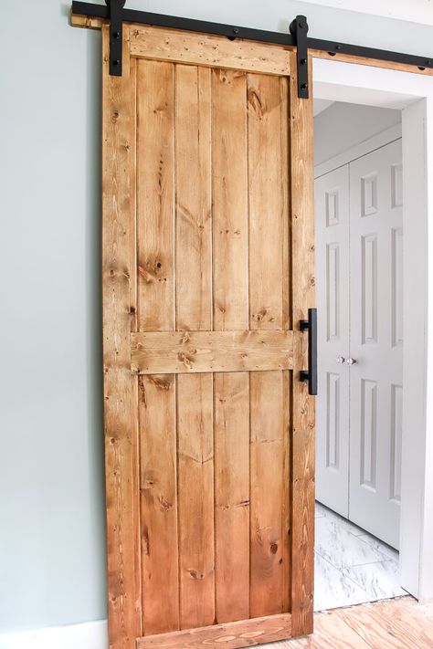 DIY barn door plans and tutorial. We snuck a little something on the back side of this door you have to see! #DIYbarndoor #barndoortutorial Diy Barn Door Cheap, Diy Barn Door Plans, Door Plans, Barn Door Ideas, Door Plan, Diy Sliding Barn Door, Barn Door Designs, Diy Barn, Diy Barn Door