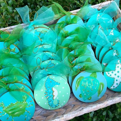 I have loved painting so many ornaments this year. Heading up to the studio to paint more today. I love rainy days when I get to stay home and paint😊  #turquoisechristmas #colorsofthesea #christmasornaments #coastalchristmas #coastalchristmasornaments #coastalchristmasdecor #clpicks #beachornaments #crabs #seahorses #seaturtles #starfish #beachlife #beachchristmas #beachchristmastree #beachchristmasdecor #lemondaisydesign #christmasdecor #christmasornaments #handpainted #etsygifts Coastal Christmas Ornaments, White Elephant Christmas, Christmas Hand Painted, Beach Christmas Decorations, Elephant Christmas, Beach Christmas Ornaments, Coastal Ornament, Turquoise Christmas, Coastal Christmas Decor