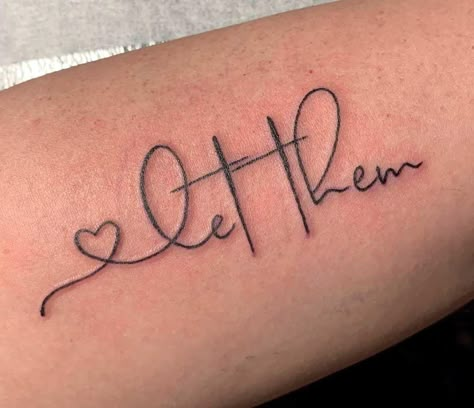 This Tattoo has gone viral along with its poem, have you read it yet? “Let Them” “Just Let them. If they want to choose something or someone over you, LET THEM. If they want to go weeks without talking to you, LET THEM. If they are okay with never seeing you, LET THEM. If they are okay with always putting themselves first, LET THEM. If they are showing you who they are and not what you perceived them to be, LET THEM. If they want to follow the crowd, LET THEM. If they want to jud... The Word Delicate Tattoo, Beautiful Sayings Tattoos, Small Let Them Tattoos, Rise Up Tattoo Symbol, Let Them Tattoo Design, Tatoos Woman Let Them, Cute Thumb Tattoos, Let Them Wrist Tattoos For Women, Trending Tattoos For Women 2024