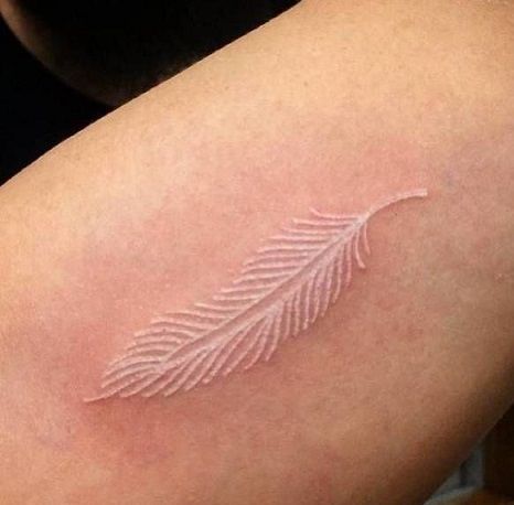 Top 9 Phenomenal White Tattoo Designs White Feather Tattoo, White Feather Tattoos, White Ink Tattoos, Mother Nature Tattoos, Literary Tattoos, Tattoo Fashion, Feather Tattoo Design, White Tattoos, White Ink Tattoo