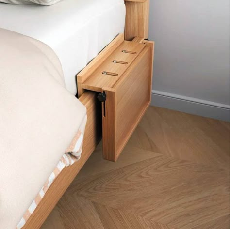 Its wooden construction matches the bed, creating a harmonious look. I love how you can fold it up when you’re not using it, so you’ve got more room to move around! Image credit: INSTAGRAM @OUTOFDECOR One Side Bedside Table, Bed Attached Side Table, Diy Bed Organizer, Fold Down Bedside Table, Clip On Bedside Table, Fold Out Bedside Table, Folding Bedside Table, Bed Without Side Tables, No Bedside Table Ideas