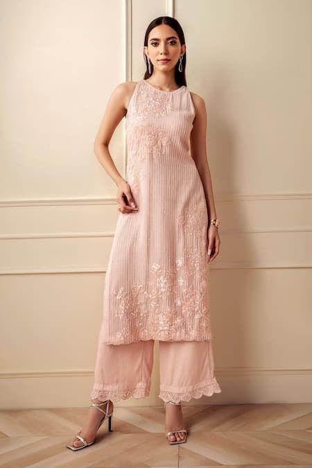 Buy Pink Georgette Embellished Rosette Sequin Work Kurta And Palazzo Set For Women by Sawan Gandhi Online at Aza Fashions. Straight Fit Dresses Western, Halter Neck Salwar Suit, Sleeveless Salwar Designs, Georgette Suit Designs Indian Style, Straight Kurta Designs, Sleeveless Kurta Designs, Halter Neck Suit, Sleeveless Kurta Set, Sleeveless Kurti Designs