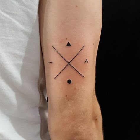 2024's Top Minimalist Tattoos: Symbols of Strength & Style Family Tattoos For Men Symbolic, Geometric Tattoo Meaning, Tattoos Symbols, Warrior Shield, Small Neck Tattoos, Matching Friend Tattoos, Small Matching Tattoos, Unique Small Tattoo, Small Forearm Tattoos