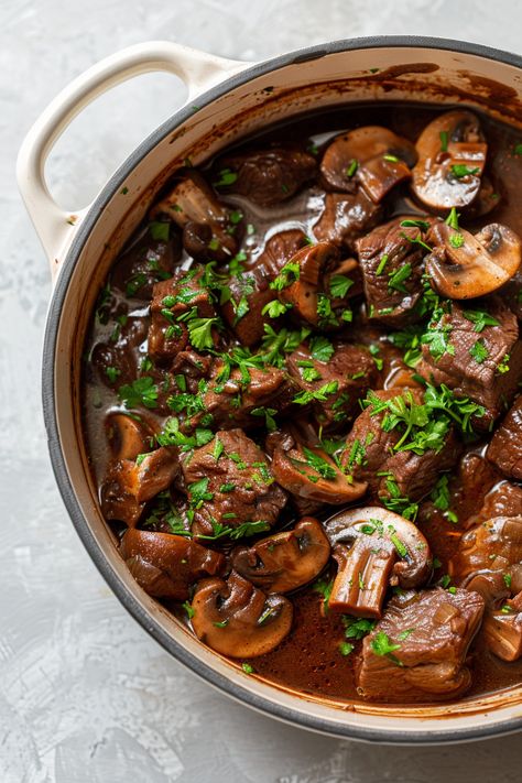 Mouthwatering Keto Dutch Oven Braised Beef and Mushroom Stew Recipe for a Healthy Meal #ketodiet #ketorecipes #lowcarb Keto Beef Mushroom Recipes, Braised Beef Stew Dutch Oven, Braised Beef And Mushrooms, Beef Stew Healthy Clean Eating, Staub Dutch Oven Recipes, Stew Meat Dutch Oven, Healthy Dutch Oven Recipes Low Carb, Mushroom Beef Recipes, Low Carb Dutch Oven Recipes