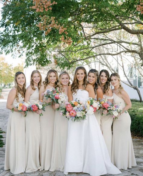 White Bridesmaid Dresses Colourful Flowers, Bridesmaid Flowers Champagne, White Bridesmaid Dresses With Colorful Flowers, Spring Garden Bridesmaid Dresses, Neutral Bridesmaid Dress With Bright Flowers, White Bridesmaid Dresses Colorful Flowers, Neutral Wedding Pop Of Color, Colorful Wedding Bouquet Bridesmaid, Neutral Wedding With Colorful Flowers