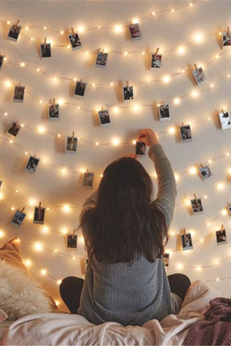 Create your own fairy tale picture wall art with these extraordinarily beautiful light strings. Use these pretty little lights with wooden pins, to create a romantic atmosphere to your bedroom, wedding, or for some other special, unforgettable moment. #bedroomdecor #teenroom #lights #photodisplay #fairylights #stringlights #weddingdecor Photo Walls Bedroom, Picture Wall Bedroom, Light Picture Wall, String Lights In The Bedroom, Best Christmas Lights, Fairy Lights Bedroom, Bedroom Pictures