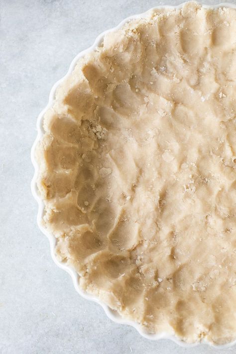 How to Make a Shortbread Cookie Pie Crust: Our Shortbread Cookie Pie Crust is like biting into a buttery shortbread cookie and complements a plethora of pies! Use it instead of a traditional pie crust for a fun twist on your next baking creation. It’s also great for tarts and easy to make with just five ingredients! Cookie Pie Crust, Shortbread Pie Crust, Desserts Pie, Chocolate Chip Cookie Pie, Yummy Pie Recipes, Gooey Chocolate Chip Cookies, Buttery Shortbread Cookies, Buttery Shortbread, Tarts Crust