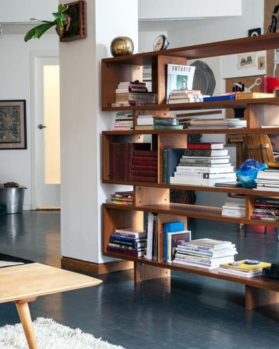 Have a large, open space that needs some privacy? This loft, originally seen on Remodelista, shows how a large bookcase is the perfect piece for the job. Room Divider Ideas Diy, Room Divider Diy, Mid Century Modern Bookcase, Bookshelf Room, Modern Room Divider, Diy Room Divider, Modern Bookcase, Room Partition, Mid Century Modern Furniture