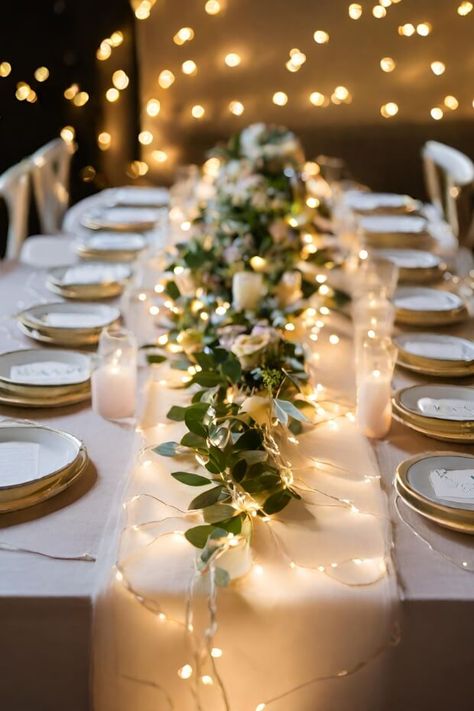 Dining table with fairy light runner Light Table Centerpieces, Lighted Table Runner, Simple Wedding Centerpieces Fairy Lights, Fairy Lights On Table Wedding, Fairy Light Wedding Table Decor, Fairy Lights Wedding Reception Table, Led Candle Wedding Centerpieces, Wedding Centerpieces Without Candles, Twinkle Light Centerpiece Wedding