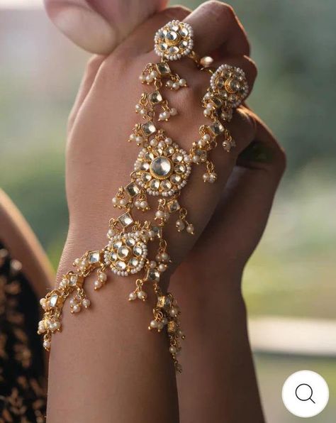 Jadau Pachi Kundan Haathphool | Pearl and Kundan Hathphool | Traditional Indian Hand Accessories | Floral Kundan Hathphool | Bridal Jewelry Bridal Hand Jewelry Indian, Hathphool Kundan, Gold Hathphool, Kundan Hathphool, Sabyasachi Designer, Hand Accessories, Gold Wedding Jewelry, Wedding Jewelry Bracelets, Floral Accessories