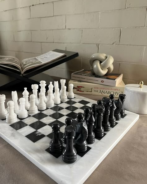 Introducing The Marble Chessboard. Crafted in solid marble, the set works as a great gift for chess lovers and can be used as a bold decor piece when not in use. DM to Order #justserene Chess Interior Design, Chess Board Aesthetic, Chess Decor, Amsterdam Apartment, Marble Chess Set, Bold Decor, Chess Sets, Coach House, A Vision Board