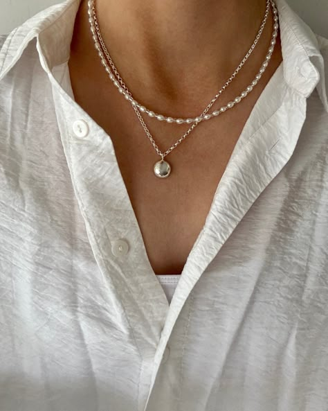 The Pearl Necklace is back in stock! ⭐️ I’ve just added a small batch of these to my website - perfect to layer with your favourite silver necklace! 💚 Trending Necklaces Silver, Sterling Silver Layered Necklace, Necklace Stacks, Neck Stack, Trendy Silver Jewelry, Fashion Vision Board, Jewelry Stack, Rice Pearls, Vacation Jewelry