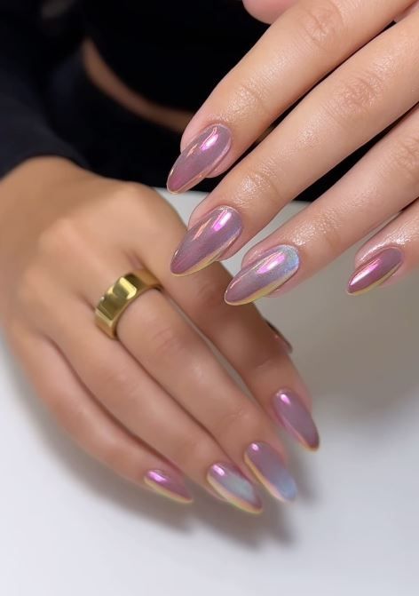 Brilliant Chrome Nails: Add a touch of modern elegance to your springtime manicure with brilliant chrome nails. These sleek and reflective finishes come in an array of stunning shades, from metallic silver to iridescent rose gold, perfect for making a bold statement. Chrome Iridescent Nails, Iridescent French Tip Nails, Pink Iridescent Nails, Iridescent Chrome Nails, Summer Nails Chrome, Matte Vs Glossy Nails, Neon Glow Nails, Chrome Nails Summer, Chrome Summer Nails