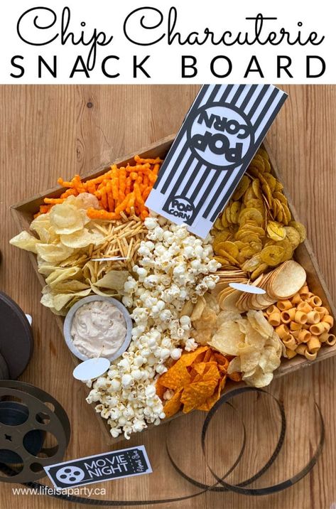 Chip Charcuterie Snack Board: calling all salty snack lovers! Combine all your favourite chips, Doritos, cheesies, and popcorn flavours for the ultimate snack board!   I love chips.  They’re so salty, and crunchy and delicious.  And there’s so many amazing varieties.  When I was planning a special movie date night the other day -see all... The post Chip Charcuterie Snack Board appeared first on Life is a Party. Snack Bowls Party, Movie Date Night Charcuterie Board, Chips Ideas For Party, Late Night Charcuterie Board, Potato Chip Charcuterie Board, Chips Board Ideas, Salty Board Ideas, Crazy Charcuterie Board Ideas, Game Night Snack Board