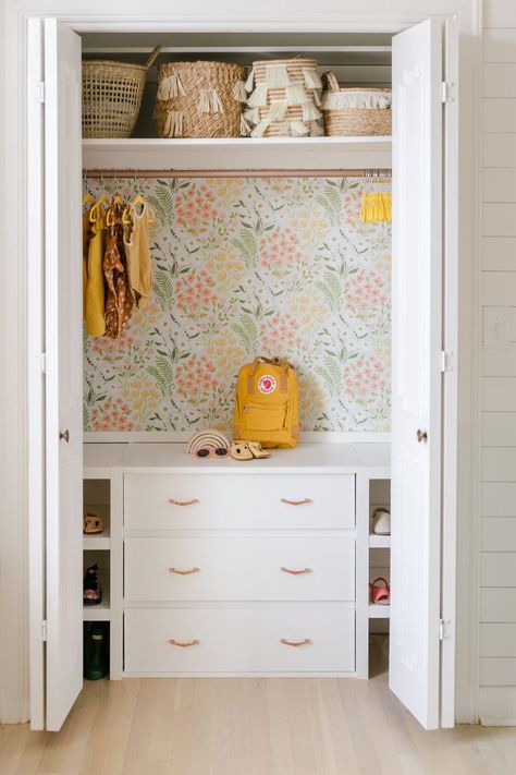 kid closet organization, girl bedroom closet organization, girl closest with floral wallpaper, girl playroom design with storage in closet, Tips for Reconfiguring a Closet - A Beautiful Mess, girl closet decor with wallpaper Closet Organization Dresser Inside, Built Out Closet Bedrooms, Small Closet With Built In Dresser, Closet Hacks Ikea, Dressing Table Closet, No Walk In Closet Ideas, Small Dresser In Closet, Open Closet Ideas Kids, Small Kids Closet Ideas