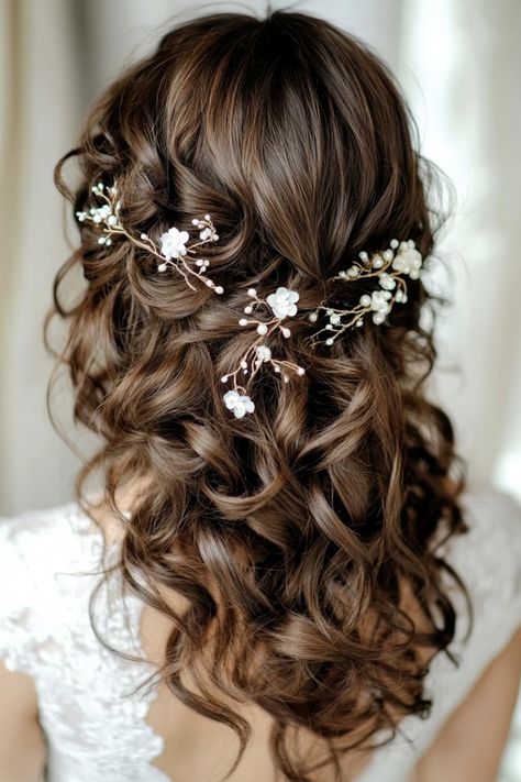 Flowers make every hairstyle magical, and these 51 bridal hairdos are proof. Featuring everything from dainty floral pins to full flower crowns, these ideas are designed to make you shine. No matter your theme, there’s a floral hairstyle perfect for your big day. See them all now! #bridalaccessories #flowerdecorations #weddinghairtrends Wildflower Wedding Hair Piece, Hair With Flowers In It, Bridal Hairstyles With Flowers, Long Brown Curly Hair, Floral Hairstyle, Floral Wedding Crown, Bridal Hairdos, Flower Hairstyles, Wedding Hairstyles With Flowers