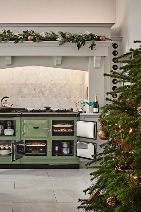 An AGA cooker is known for its large cast-iron ovens and can accommodate a 26 lbs turkey or up to seven pans, easing the strain over Christmas when cooking for a crowd. Thanks to its generous cast-iron ovens that cook with indirect radiant heat, an AGA cooker performs like no other, resulting in delicious food that tastes better.⁠ The larger AGA models provide enhanced cooking capacity with extra ovens and flexibility with the option of either a warming plate or a state-of-the-art induction hob. Aga Kitchen, Aga Stove, Aga Range, Aga Cooker, Cast Iron Oven, Freestanding Range, Kitchen Decor Styles, Kitchen Appliances Luxury, Range Cooker