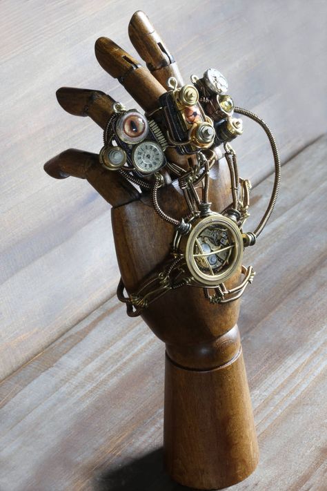 Steampunk mechanical hand by CatherinetteRings on DeviantArt Aesthetic Steampunk, Moda Steampunk, Steampunk Items, Steampunk Gadgets, Mode Steampunk, Steampunk Aesthetic, Steampunk Couture, Beautiful Halloween, Art Steampunk