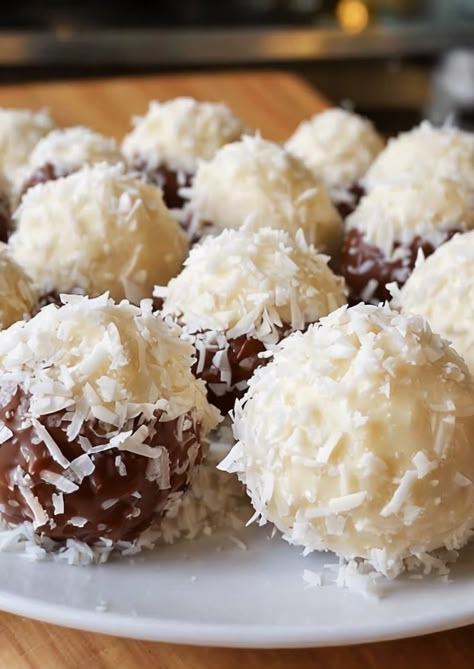 Indulge in these easy No Bake Coconut Cream Balls! 🥥🍬 Perfectly sweet and creamy, they're a quick treat for coconut lovers. Ready in minutes! #NoBakeTreats #CoconutLovers #SweetSnacks Coconut Cream Balls Recipe, Coconut Cream Balls, No Bake Coconut Cream Balls, Coconut Bon Bons Recipe, Coconut Balls No Bake, Coconut Milk Recipes Dessert, Coconut Dessert Recipes, Coconut Recipes Dessert, Coconut Cream Recipes