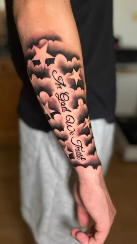 Men’s forearm tattoo with clouds and stars Half Sleeve Cloud Tattoos For Men, Cloud Tattoo Cover Up, Clouds Around Name Tattoo, Tattoo For Lost Loved One For Men, Clouds With Stars Tattoo, First Forearm Tattoo Ideas Men, Built Different Tattoo, Clouds Stars Tattoo, Rip Tattoos For Friend