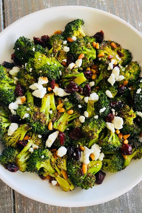 broccoli topped with cranberry and goat cheese Broccoli And Goat Cheese, Thanksgiving Sides Broccoli, Brocolli Thanksgiving Side, Easy Green Side Dish, Holiday Veggies Sides, Broccoli Christmas Side Dish, New Years Dinner Side Dishes, Broccoli Thanksgiving Side Dish, Vegetable Sides Christmas