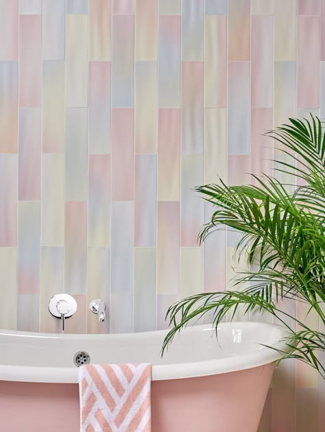 Pink bathtub in front of a wall tiled with pastel tiles. Rainbow inspired theme Latest Bathroom Trends, Pastel Bathroom, Rainbow Tile, Art Deco Style Interior, Ceramic Floor Tiles, Bathroom Trends, Pink Bathroom, Childhood Nostalgia, Dream Bathroom