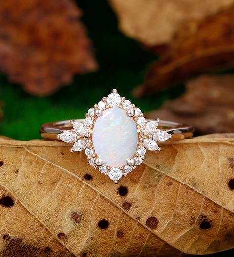 Engagement Ring Metal Type: 925 Sterling Silver, Soild 10k Gold, Solid 14k Gold, Solid 18k Gold Center Stone: Lab Created Opal Center Carat Weight: Oval Cut 1.5CT (6x8mm) Side Stone: Simulated Diamond / Moissanite Side Carat Weight: 0.44ctw Band Width: 2mm SKU: ESAMXR0005-opal Accessories: *Shipped with beautiful ring box; *Directly price from Manufacturer, 1/3 the price from Jewelry Store; - Ethically Sourced White Gold Opal Engagement Ring, Wedding Rings With Opal, Opal And Gold Ring, Opal Vintage Engagement Ring, Pearl And Opal Ring, Boho Wedding Ring Set, Rings Engagement Opal, Diamond And Opal Ring, Opal And Diamond Engagement Rings