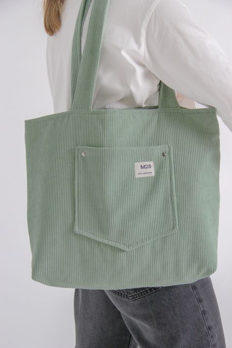 This bag handmade with love in SaintPetersburg!Basic design is perfect choice for everyday&casual outfits. There is one pocket outside the bag for small items as keys, cards, smartphone and so on.Size: 36x45 cm, handles 70 cmMaterial of top: corduroy polyesterColour: mint Corduroy Tote Bag, Handmade Fabric Bags, Tote Bag With Pockets, Tote Bags For School, Everyday Casual Outfits, Tote Outfit, Everyday Tote Bag, Diy Bag Designs, Stylish Tote Bag