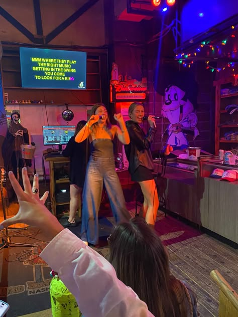 Two pub crawl guests singing karaoke! Karaoke Bar Aesthetic Friends, Music Friends Aesthetic, Karaoke Night Ideas, Karaoke Photoshoot, In And Out Aesthetic, College Fun Aesthetic, Karaoke Pictures, Country Bar Aesthetic, Karaoke Bar Aesthetic