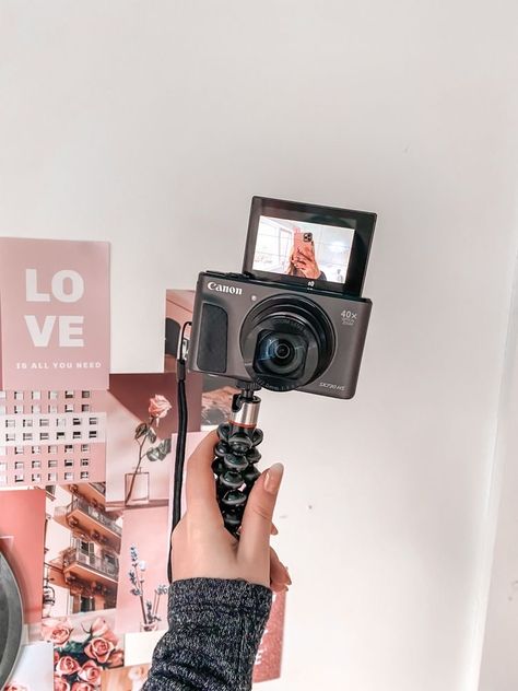 girl holding camera on tripod in front of pink backdrop Vlogging Aesthetic, Best Vlogging Camera, Canon G7x Mark Ii, Kamera Dslr, Lauren Asher, Youtube Channel Ideas, Dirty Air, Vlogging Camera, Life Vision Board