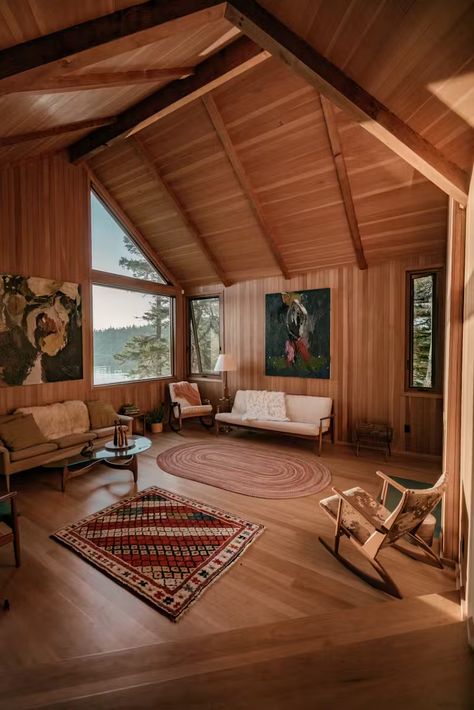 Photo 4 of 19 in A Maine Couple Find Their Passion for Design in an Island Cabin Renovation from The 20 Most-Liked Homes on Our Instagram in 2023 - Dwell Mid Century Modern Cabin, 70s Cabin, Light Hardwood Floor, Cabin Renovation, Light Hardwood, Light Hardwood Floors, Floor Lighting, House Design Photos, Exclusive Home