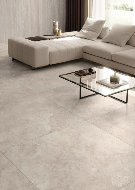 Pietra Tiburtina tile collection by Casalgrande Padana Tiles For Floor Living Room, Tiles For Drawing Room, Living Room Flooring Tiles, Luxury Living Room Flooring Ideas, Big Tiles Living Room, Grey Flooring Decor Ideas, Drawing Room Tiles Design, Tiled Floors Living Room, Vitrified Tiles Flooring Living Rooms