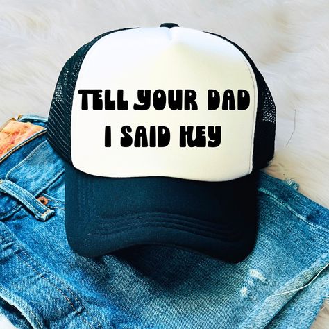 Trucker Hats For Women: Tell Your Dad I Said Hey This Trucker-Style Hat Features A Black Visor And Mesh Back With An Adjustable Snap Closure. The Front Panel Of The Hat Is Solid White And Font Is Black ** Reach Out If You Are Interested In Other Hat Colors Or A Different Font You Like!! Hat Sayings Ideas, Funny Trucker Hats For Women, Trucker Hats For Women, Hat Quotes, Female Trucks, Funny Trucker Hat, Hat Bar, Fav Products, Women Trucker