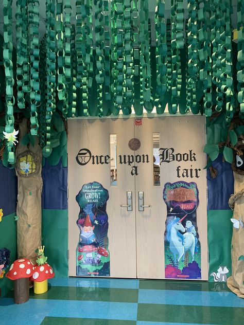 Forest Hallway School, Robin Hood Classroom Door, Fairy Tale Ball Decorations School, Fairytale Summer Camp, Story Book Decorating Ideas, Enchanted Forest Theme Book Fair, Scholastic Book Fair Decorations, Scholastic Book Fair Bulletin Board, Enchanted Forest Hallway Decor