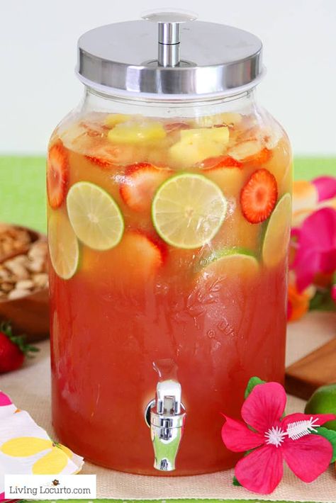 Tropical rum punch is a delicious summer cocktail recipe for a luau party or to sip by the pool! A pitcher drink mixture of juice and coconut rum for a pretty layered drink. Beach Punch, Tropical Rum Punch, Cocktail Punch, Pane Naan, Yummy Summer Cocktails, Pitcher Drinks, Rum Punch Recipes, Layered Drinks, Party Drinks Alcohol