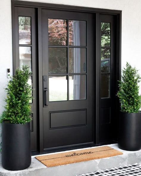 THE DESIGN DEN HOMES INC. | In Feng Shui, they say a black front door absorbs, attracts, and brings in positive energy to a home, making it a favourable colour choice… | Instagram Black Front Door Colonial House, Front Door Ideas Colonial House, Black Frame Front Door, Front Door And Windows Entrance, Front Doors Black Modern, Frosted Front Door Entryway, Black Front Door With Side Panels, White Windows Black Door, Black Front Door Craftsman