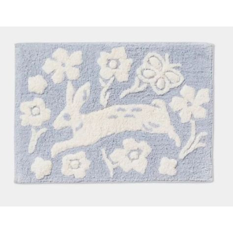 Rectangular Tufted Bath Rug In Light Blue Easter Floral Bunny Design In White 100% Cotton Construction Medium Pile Height Machine Wash And Tumble Dry Measures 24in X 17in Made In Green By Oeko-Tex White Bath Mat, Cotton Bath Mats, Easter Floral, Mirrored Wallpaper, Cotton Bath Rug, Bunny Designs, Light Blue Background, Bath Mat Rug, Machine Washable Rugs