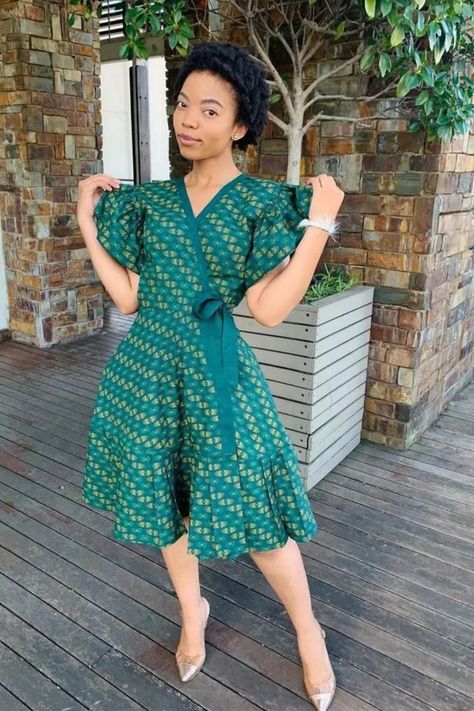 A lady wearing an Ankara wrap gown Wrap Gown Styles Nigeria, Short Dress Styles For Women, Ankara Wrap Gown Styles, Wrap Ankara Dress, Ankara Wrap Dress Styles, Simple Ankara Dress Styles, Wrap Gown Styles, Ankara Dress Styles For Ladies, Short Dress 2023