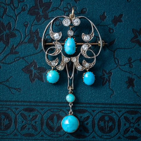 Friday Feature 💙 A beautiful antique Art Nouveau pendant from the Edwardian era decorated with glistening old cut diamonds and five natural turquoise droppers. The largest turquoise is approx. 2ct and hangs from a swinging pendulum at the bottom. The diamonds are SI 1 Clarity - H Colour and the largest are 0.12ct each, approx. 0.75ct in total. The gallery is a union of silver and 18ct gold with a lovely open-work design and curling, foliate motifs. It’s in excellent condition and has been ... Number 19, Art Nouveau Pendant, The Edwardian Era, Edwardian Jewelry, Edwardian Art, Work Design, Edwardian Era, Girly Jewelry, Pendant Silver