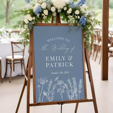 Elegant Wildflower Periwinkle Blue Wedding Sign - a perfect way to welcome guests for a spring or summer wedding! Spring Wedding Florals Blue, July Wedding Inspiration, Navy And French Blue Wedding, Something Blue Wedding Flowers, Welcome Sign Wedding Rustic, Light Blue Outdoor Wedding, Spring Wedding Dusty Blue, Lilac And Blue Wedding Decor, Light Blue Wedding Ceremony