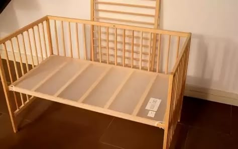 Convert Ikea Crib to Co-Sleeper - Imgur Ikea Crib Hack Co Sleeper, Crib Beside Bed, Ikea Singular Crib Hack, Sniglar Crib Nursery Ikea Hacks, Ikea Bedside Crib, Ikea Crib Co Sleeper, Ikea Crib Sniglar, Diy Sidecar Cosleeper, Ikea Crib Hack Sniglar