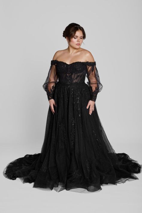 Black wedding dresses make a bold and beautiful statement, offering an unforgettable twist on traditional bridal fashion. For the bride who dares to embrace her individuality, these gowns blend timeless elegance with a touch of mystery. From intricate lace details to dramatic silhouettes, this guide explores the allure of black wedding dresses that cater to diverse styles and body types. | black wedding dresses | unique wedding dresses | #wedding #bride #dress Romantic Black Wedding Dress, Pretty Black Wedding Dresses, Black Wedding Dresses Plus Size Gothic, Black Wedding Dress Curvy, Black Off The Shoulder Wedding Dress, Black Wedding Veil With Crown, Gothic Bride Aesthetic, Black Wedding Dresses Long Sleeve, Black Fairytale Wedding Dress