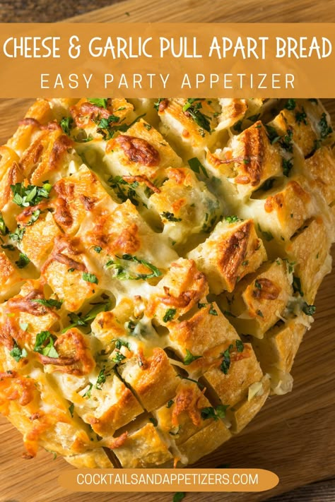 This easy to make cheesy garlic pull apart bread is ready in under 25 minutes. This savory appetizer is the perfect appetizer for holiday parties and tailgating party food. Cheese, garlic and herbs in a french bread, scored and full of melty cheese delicious goodness! Delicious as a game day snack, appetizer or along with dinner! Crusty Bread Appetizers, Cheesey Garlic Monkey Bread, Party Bread Pull Apart, Gruyere Pull Apart Bread, Blooming Bread Pull Apart, French Bread With Cheese, Garlic Bread Twists Recipe, Cheese And Garlic Pull Apart Bread, Appetizer Using French Bread