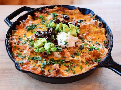 Enchilada Skillet Recipe | Ree Drummond | Food Network Ree Drummond Enchiladas, Cast Iron Skillet Enchiladas, Cast Iron Enchiladas, Enchilada Skillet Pioneer Woman, Enchilada Skillet Recipe, Skillet Enchiladas, Enchilada Skillet, Chicken Enchilada Skillet, Ree Drummond Recipes