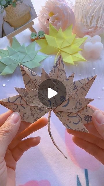 paper crafts creator on Instagram: "During the graduation season, gift a folded maple leaf bookmark to celebrate their achievements! 🍁📚 #OrigamiTutorial #Origami #MapleLeafBookmark #BookmarkOrigami #GraduationGifts" Origami Maple Leaf, Teabag Folding, Craft Ideas Paper, Leaf Bookmark, Origami Bookmarks, Origami Paper Folding, Origami Bookmark, Diy Leaves, Origami Ideas