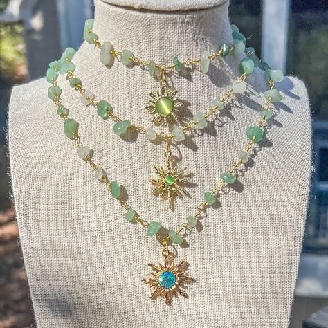 "Sun Green Aventurine Crystal Necklace/Gemstone Choker/Hippie Boho Crystal Jewelry/Wire Wrapped Crystal Necklace w/sun Charms/Handmade/Gift - Choker style crystal necklace with Green Aventurine Crystal Chip Beads and sun charm - Length is 15\",16\", 17\", 18\" and 19\"  - Materials: Gold plated copper wire, natural Green Aventurine crystals and, brass charms Check other styles in my shop: https://www.etsy.com/listing/1495642204/carnelian-sun-charm-wire-wrapped-gold?click_key=767e5654fd339a2ab4b9 Mitski Concert, Wire Wrapped Crystal Necklace, Wrapped Crystal Necklace, Wire Wrapped Crystal, Green Aventurine Crystal, Bijoux Fil Aluminium, Gemstone Choker, Aventurine Crystal, Wrapped Crystal