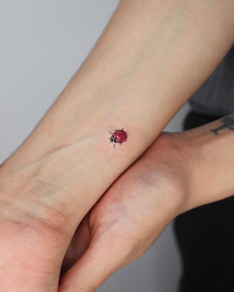 Small Lady Bug Tattoos, Micro Ladybug Tattoo, Ladybug Tattoo On Wrist, Ladybug Tattoo Placement, Ladybug Tattoo Color, Bee And Ladybug Tattoo, Ladybug Tattoo Behind Ear, Red Ladybug Tattoo, Thank You Tattoo