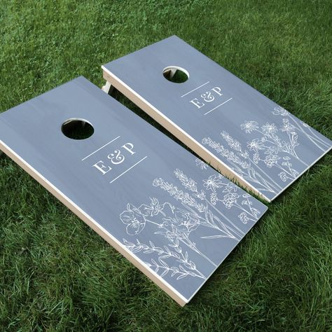 Elegant Wildflower Periwinkle Blue Wedding Cornhole Set - a great way to add fun to an outdoor wedding. A perfect keepsake for the happy couple! Bridgerton Outdoor Wedding, Wedding Inspo Centerpiece Ideas, Sage And Blue Wedding Decor, Wedding Decor Ceremony Outdoor, Wedding Outdoor Tables, Dusty Blue Forest Wedding, Fun Outdoor Wedding Ideas, Dusty Blue Backyard Wedding, Wedding Redo Ideas